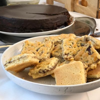 Home- and student-made traditionally Austrian desserts “Sachertorte“ and “Linzerschnitte“